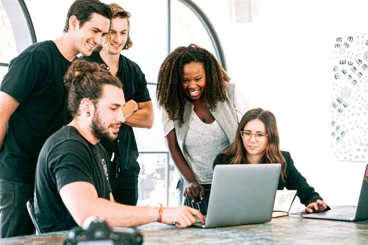 Adults Track — students learning finance and entrepreneurship hands-on